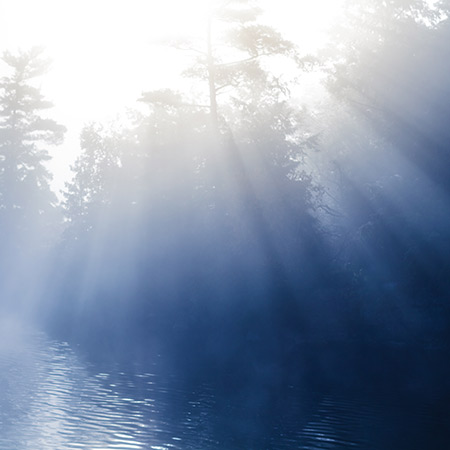 Calm foggy lake