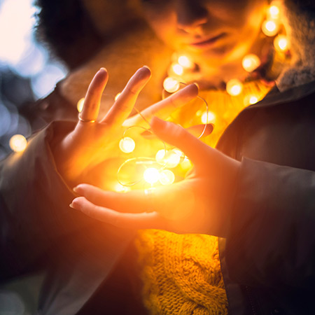 Girl holding lights